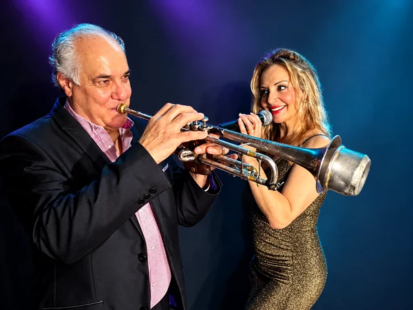 Eva Llort with a trumpet player